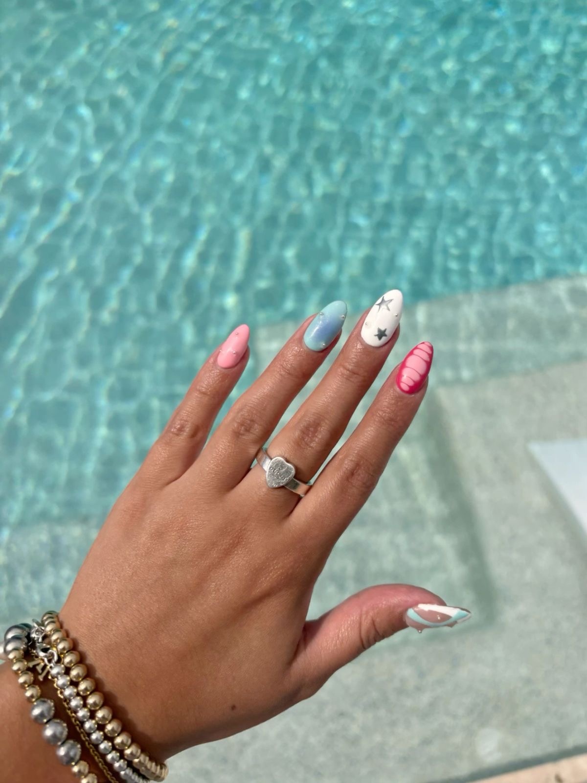 Almond glitter French nail design by Aria Rose