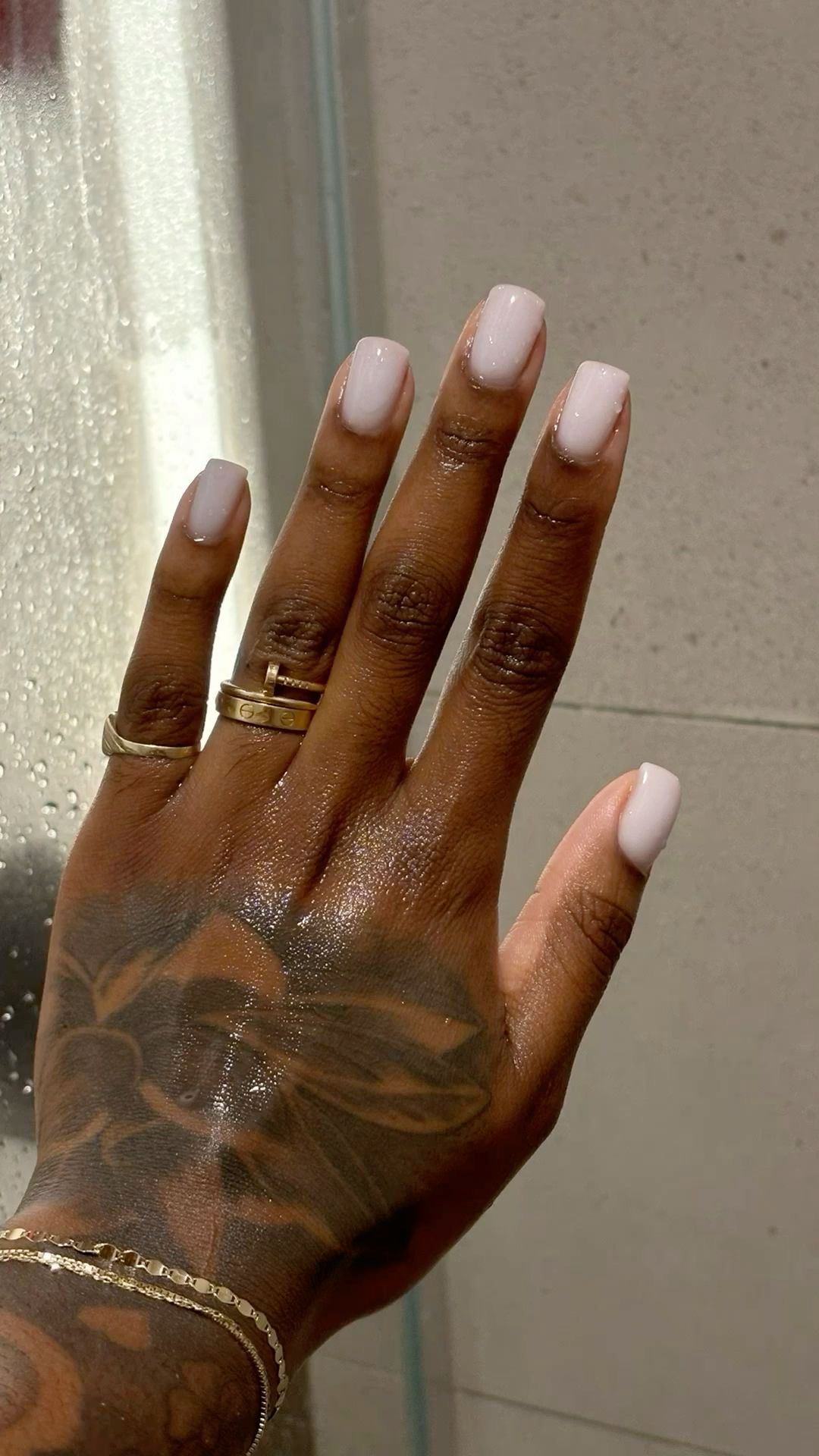 Oval rhinestone nail design by Isla Bloom
