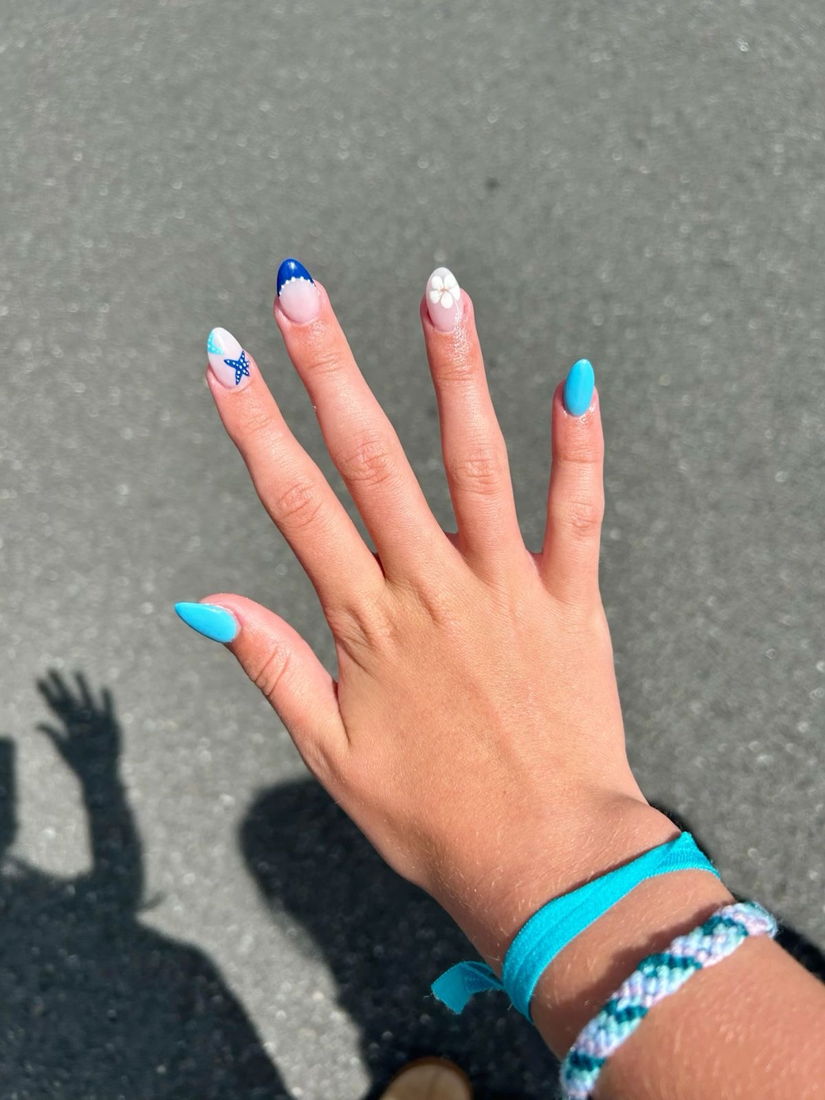 Square minimalist nail design by Zara Malik