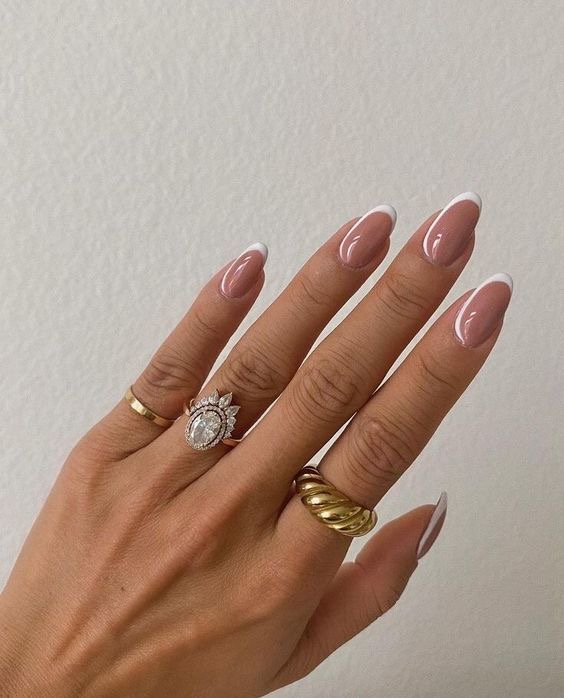 Almond floral nail design by Clara Bloom