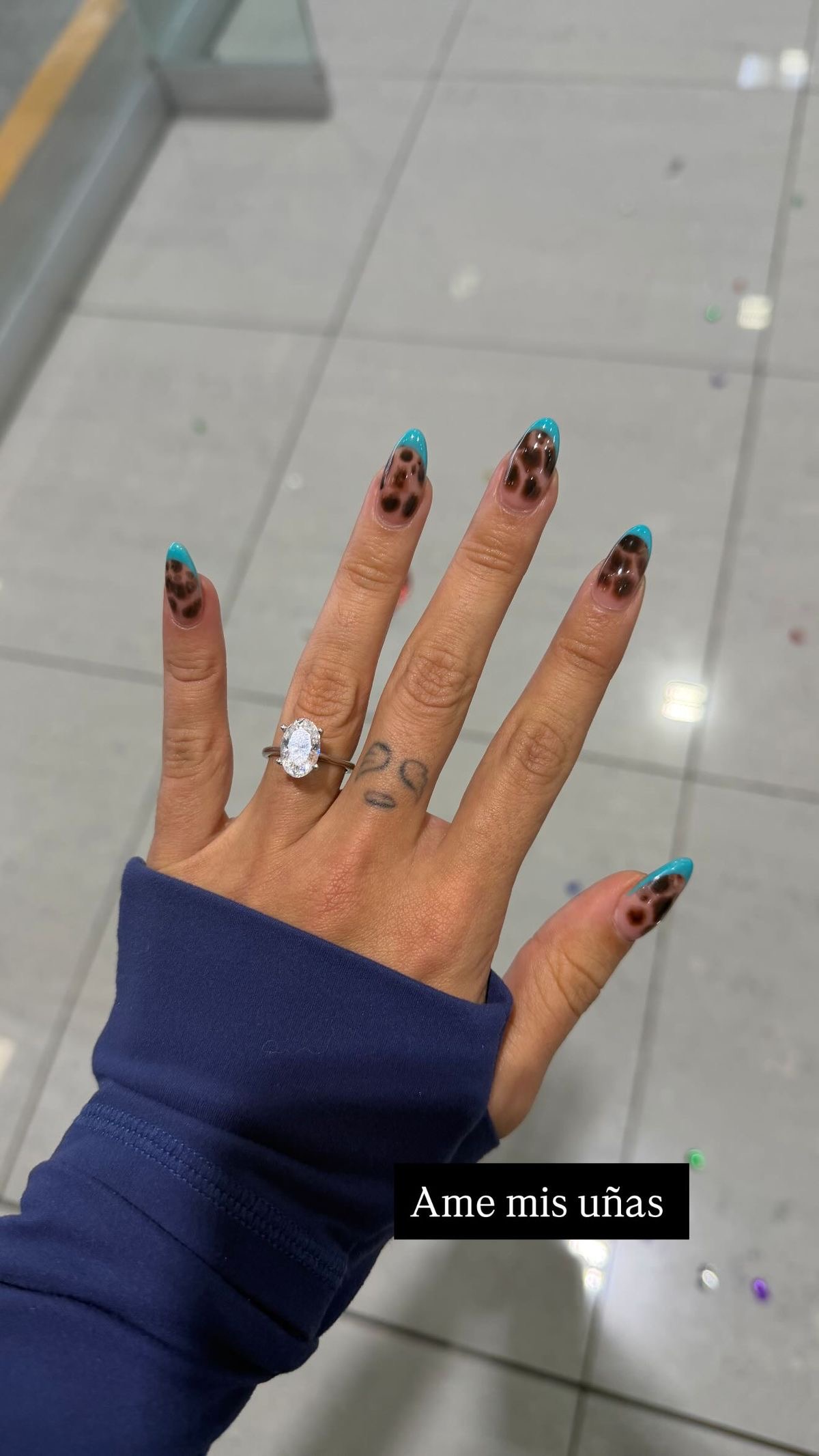 Square rhinestone nail design by Clara Bloom