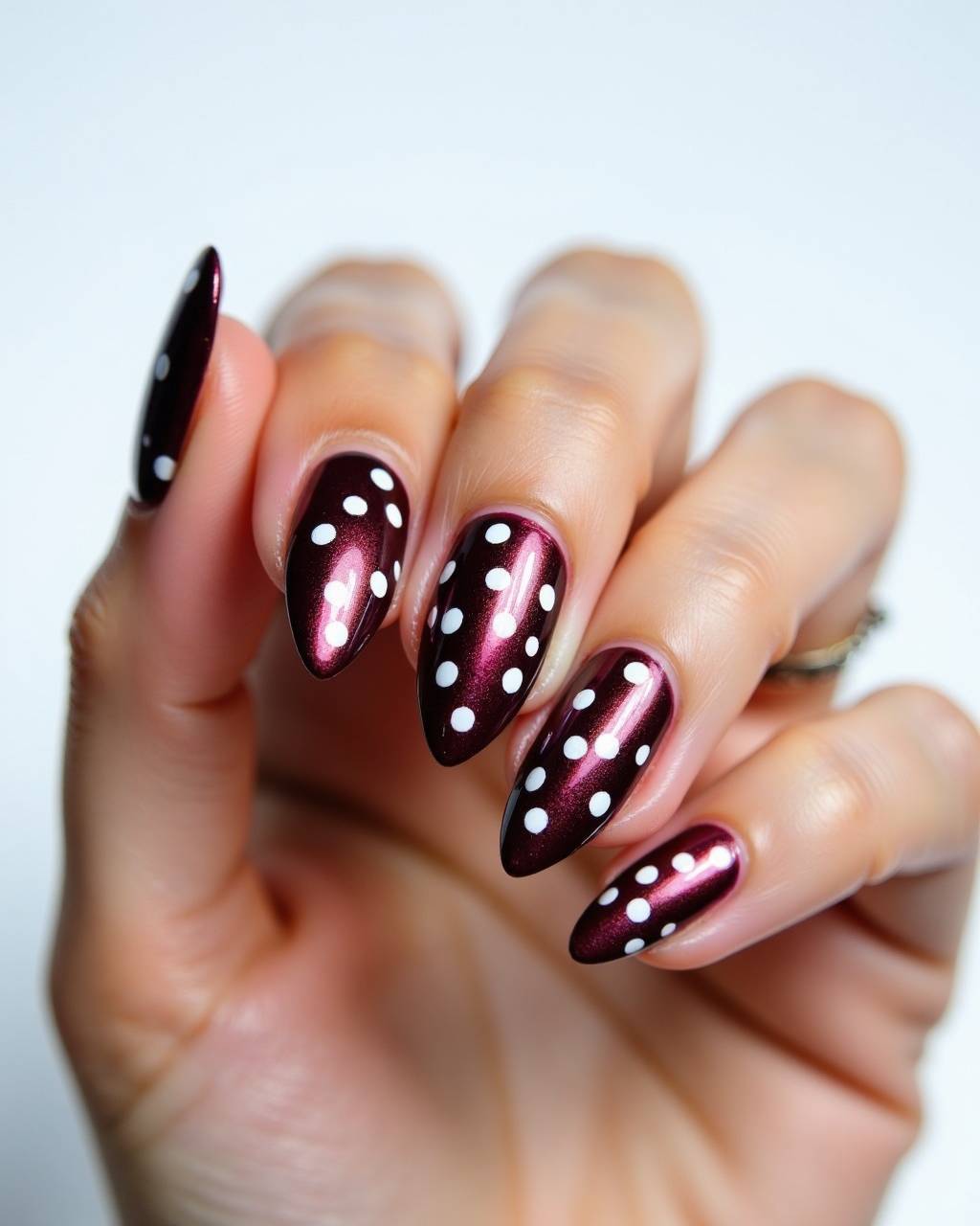 Almond geometric nail design by Amara Okafor