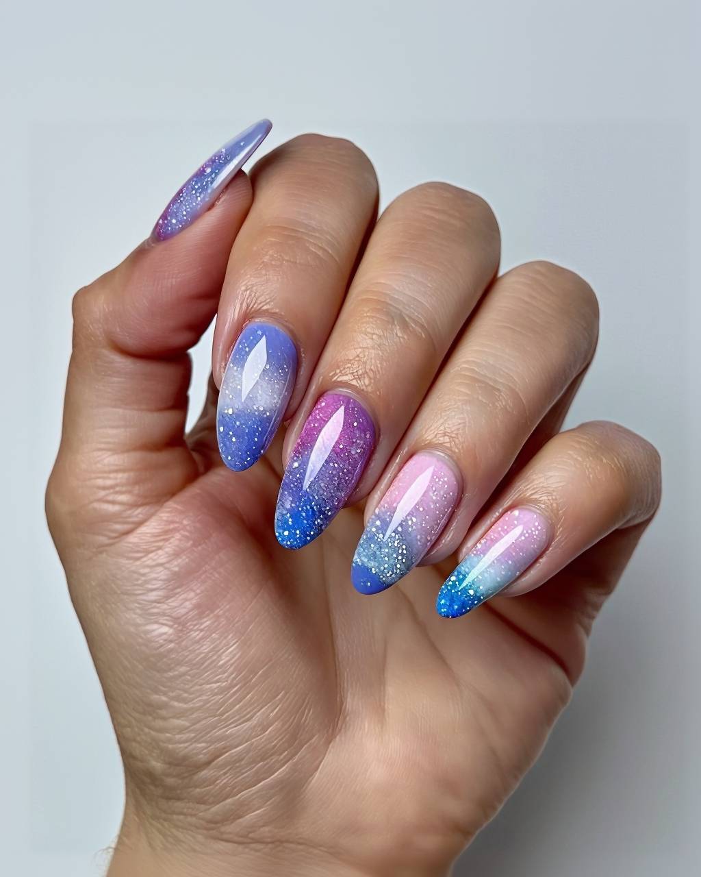 Stiletto ombre nail design by Amara Okafor