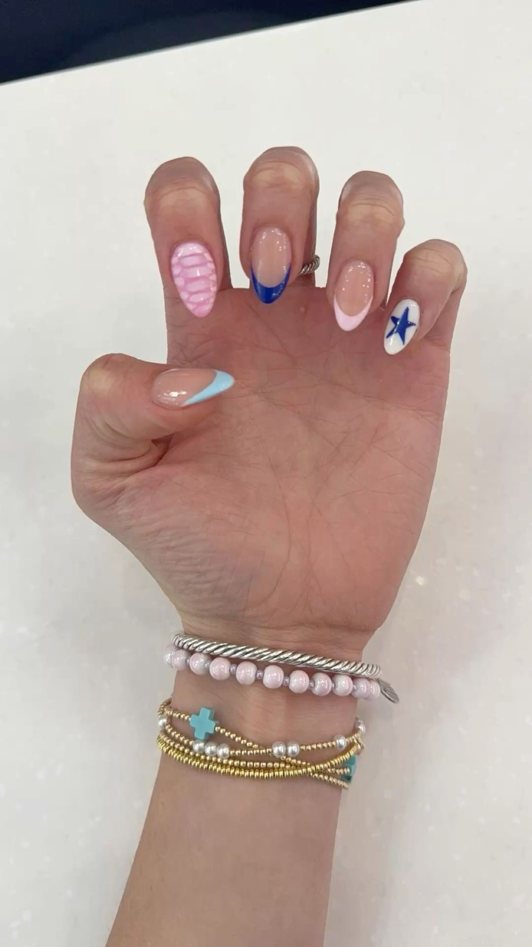 Almond rhinestone nail design by Jasmine Rose