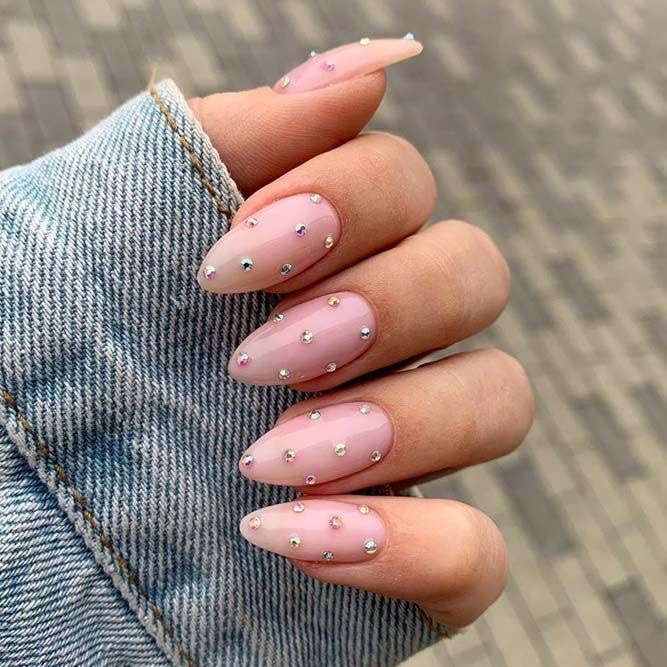 Stiletto rhinestone nail design by Freya Hansen