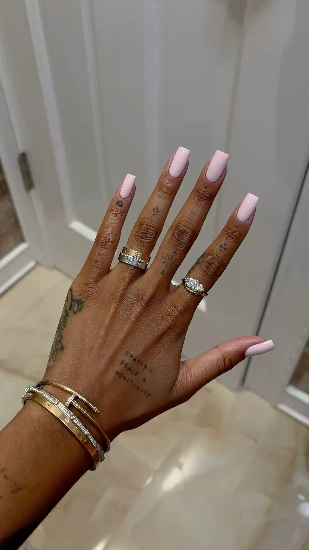 Squoval marble nail design by Mila Grace