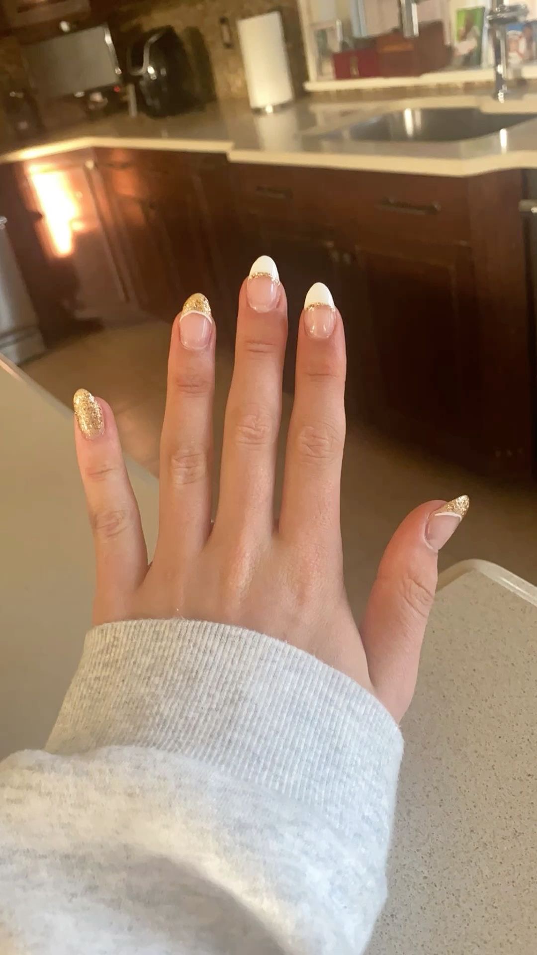 Oval glitter French nail design by Lucy Belle