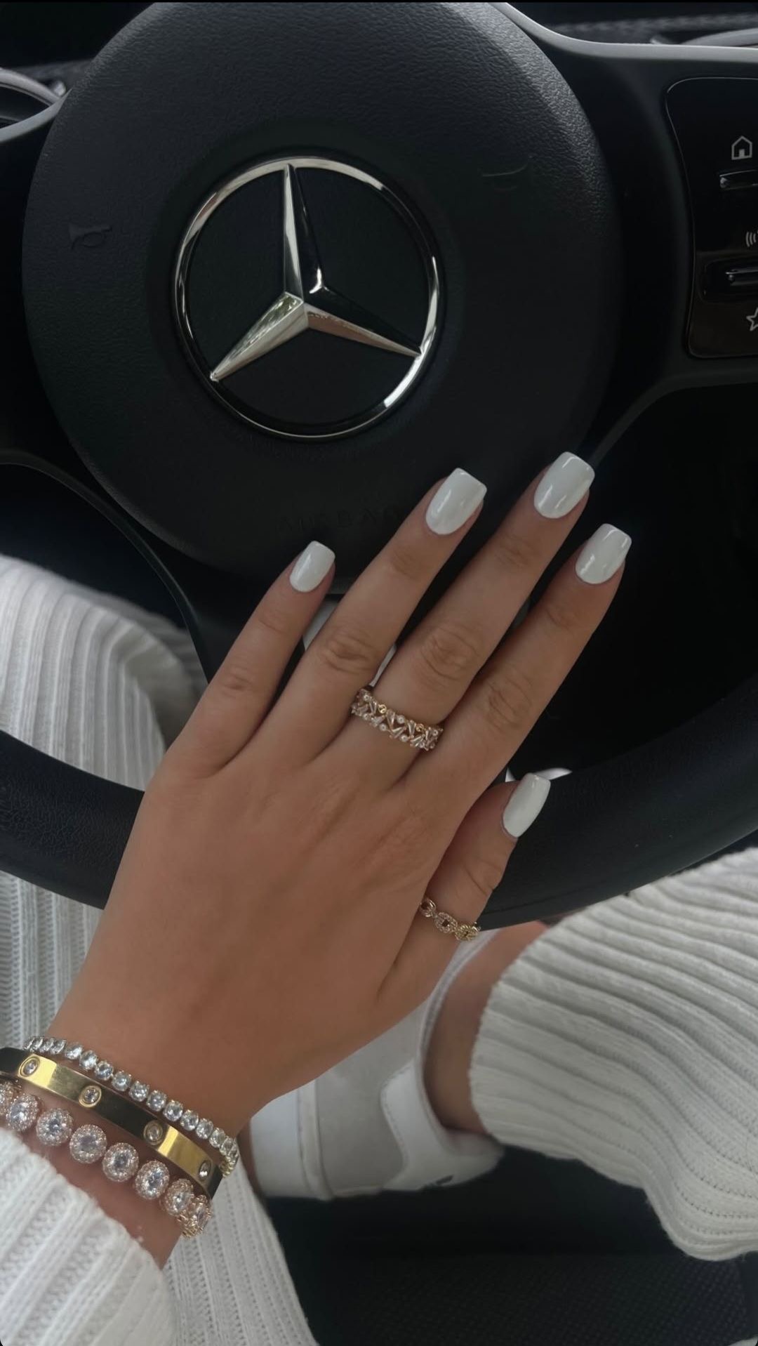 Square marble nail design by Mae Sullivan