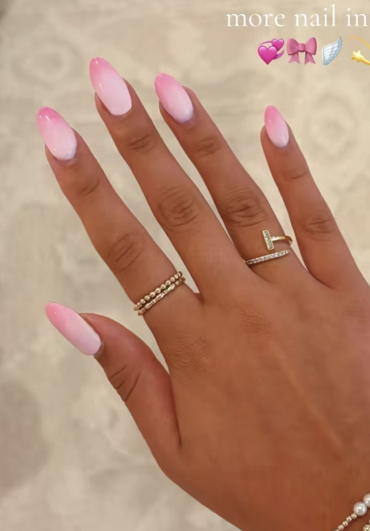 Almond rhinestone nail design by Kylie Bloom