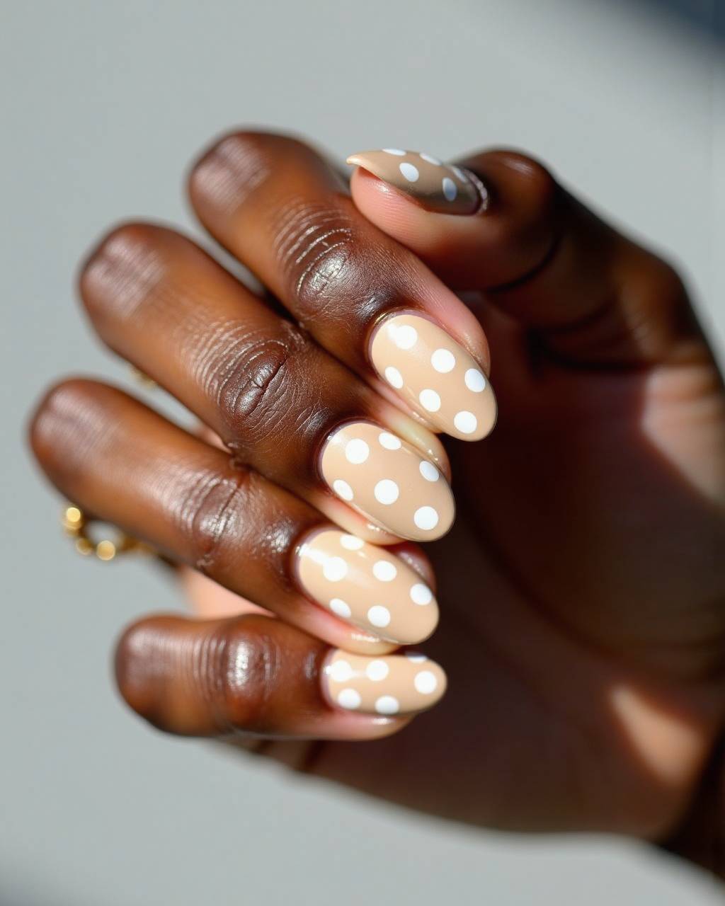 Oval geometric nail design by Ava Bennett
