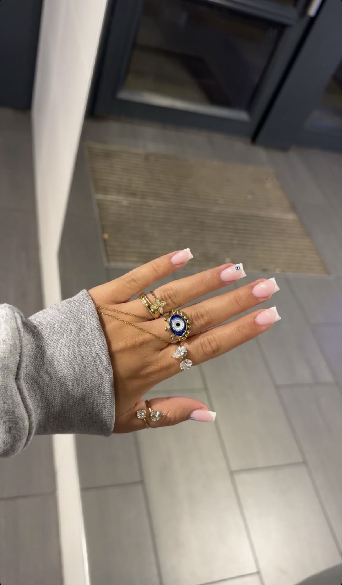 Oval glitter French nail design by Natalie Quinn