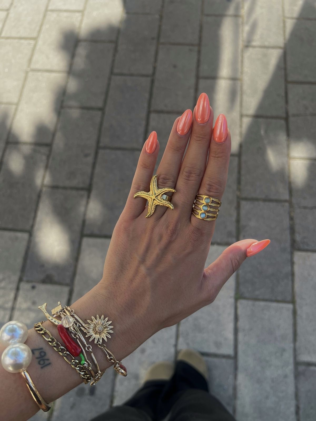 Almond glitter French nail design by Scarlett May