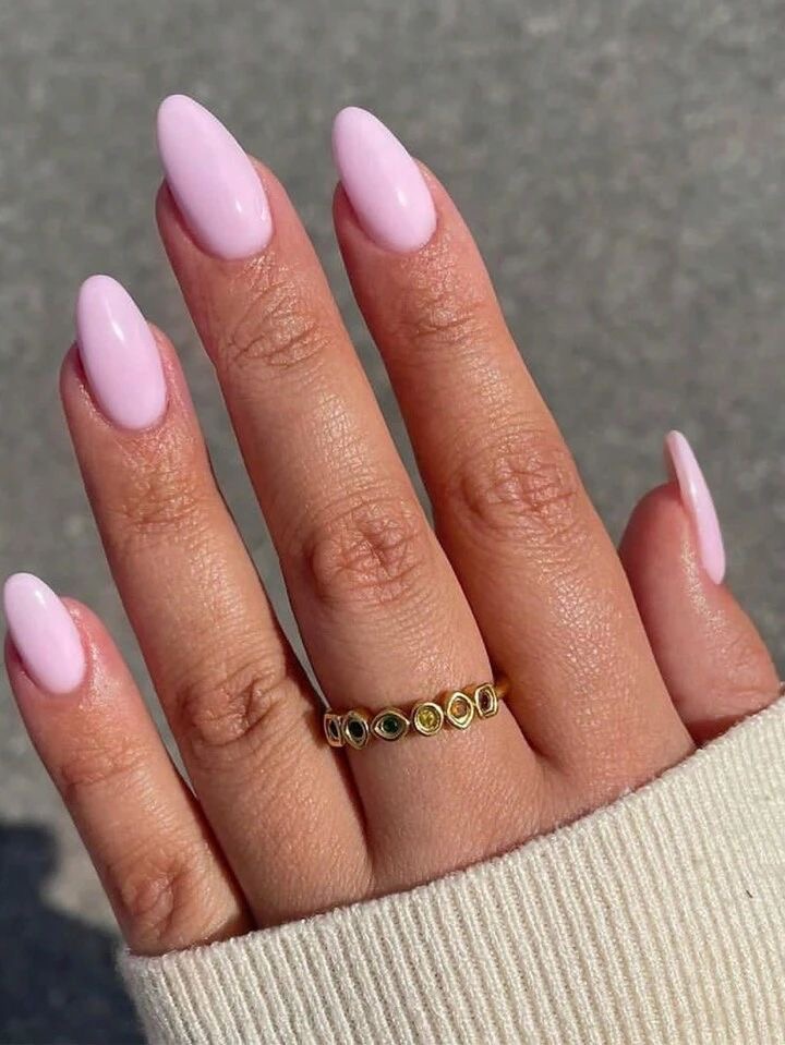 Almond rhinestone nail design by Layla Al-Jamil