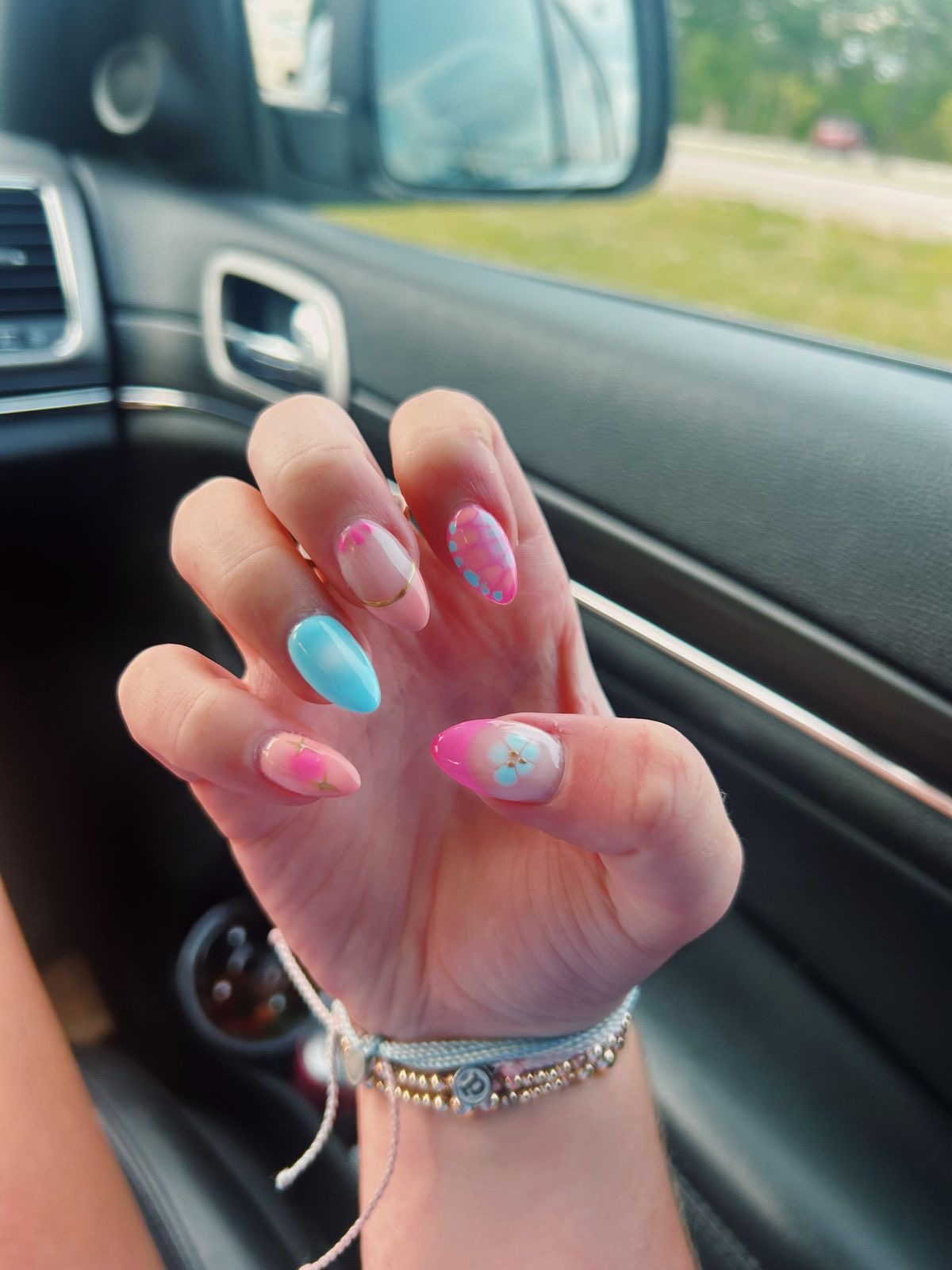 Almond chrome French nail design by Sienna Brooks