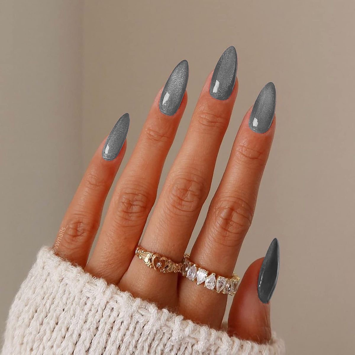 Almond animal print nail design by Sienna Brooks