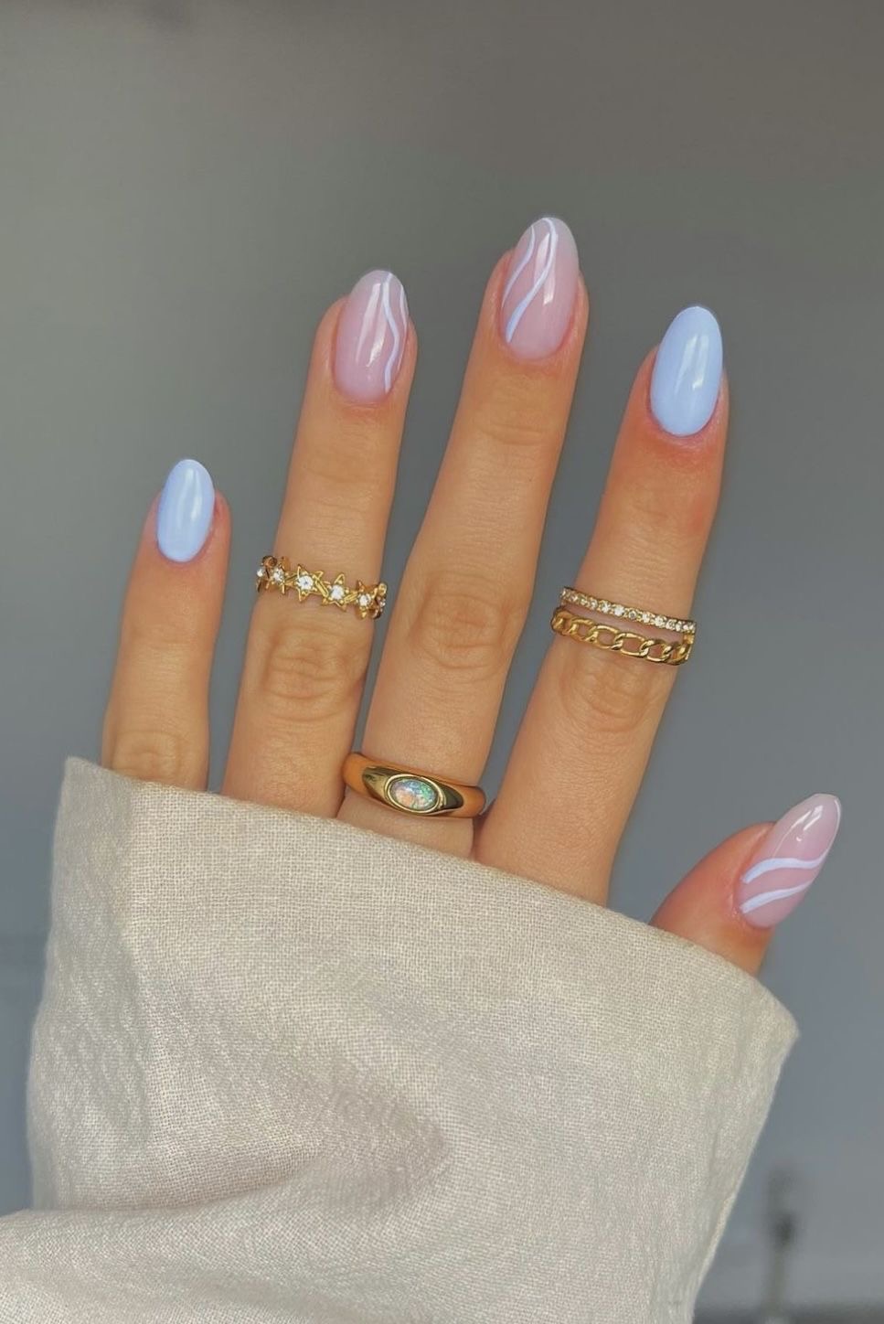 Oval aura nail design by Ariana Grace