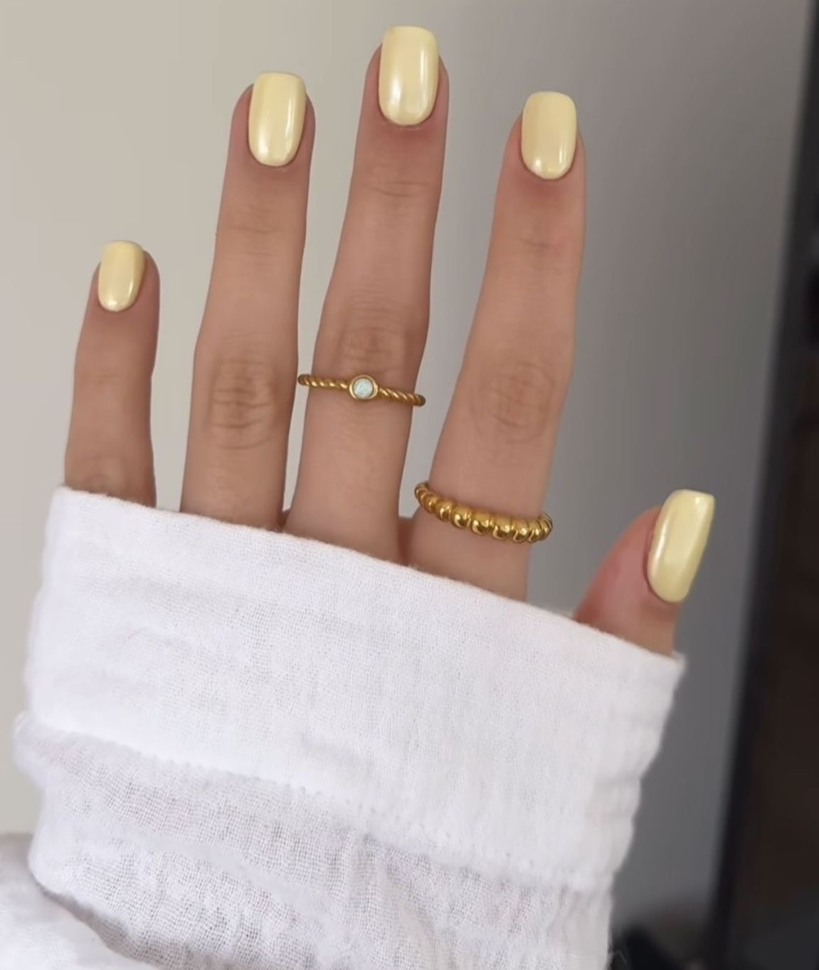 Almond rhinestone nail design by Emma Hart