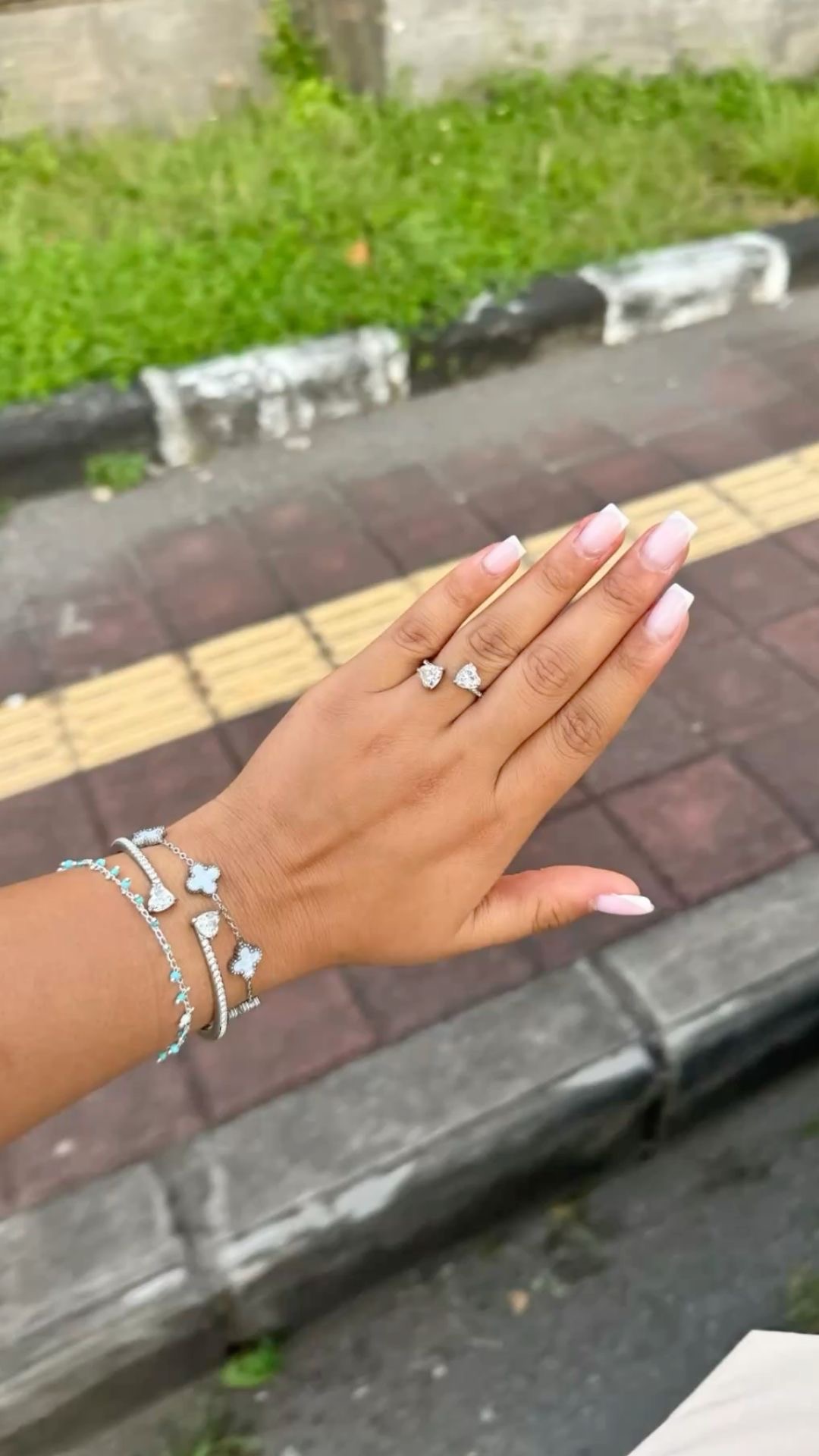 Almond rhinestone nail design by Emma Hart