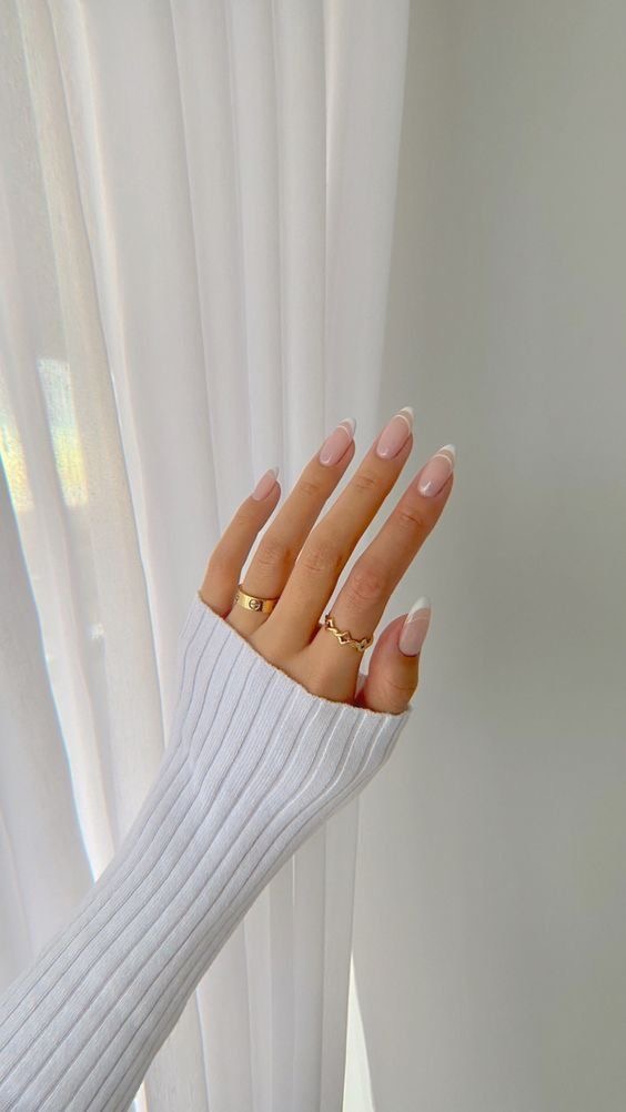 Almond chrome French nail design by Hazel Bloom