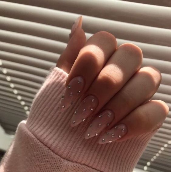 Almond French nail design by Noor Haddad