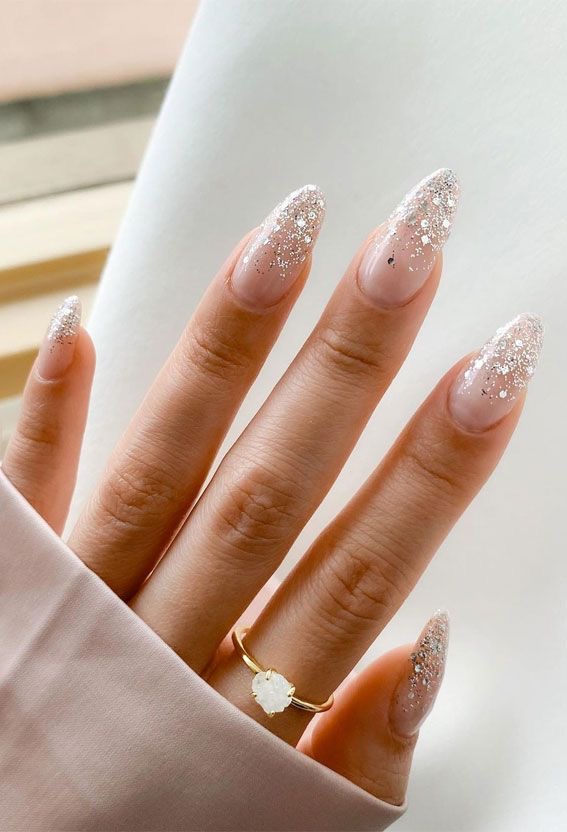 Stiletto floral nail design by Noor Haddad