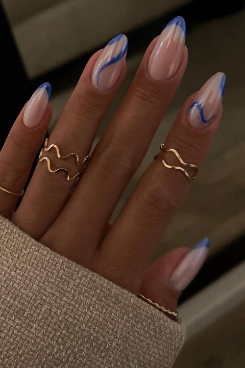 Almond marble nail design by Noor Haddad