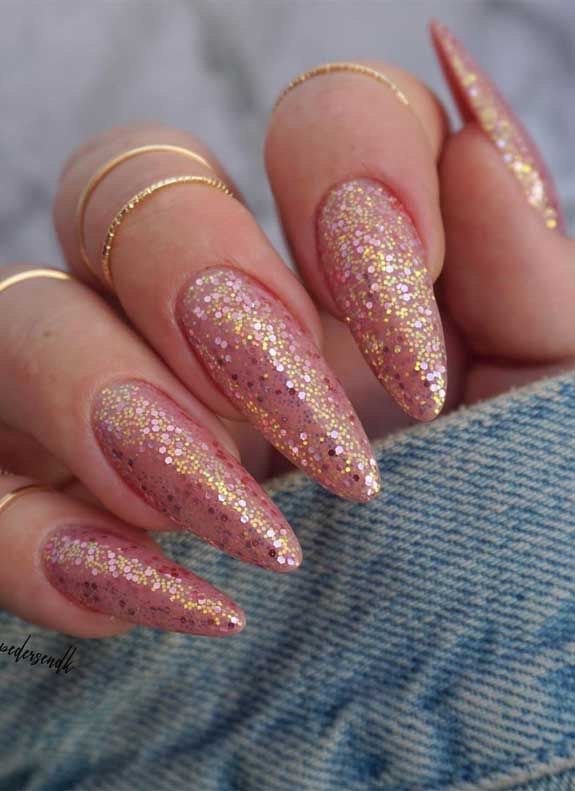 Almond rhinestone nail design by Naomi Belle