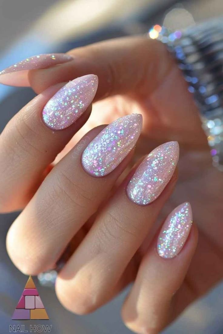 Stiletto rhinestone nail design by Charlotte Bloom