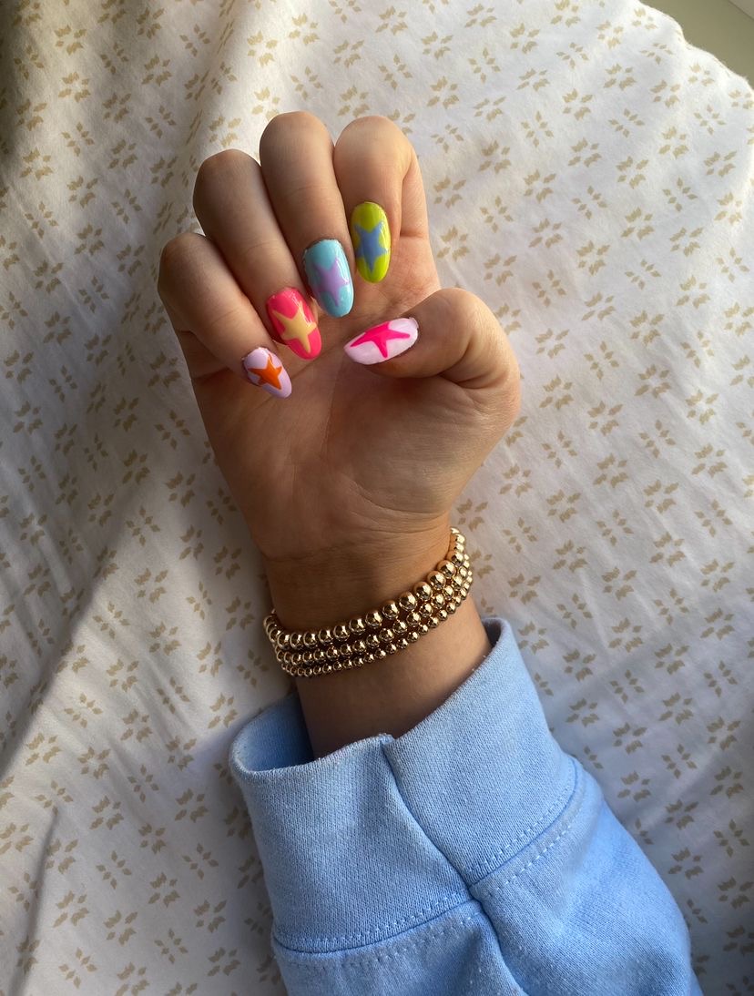 Almond rhinestone nail design by Hannah Rae