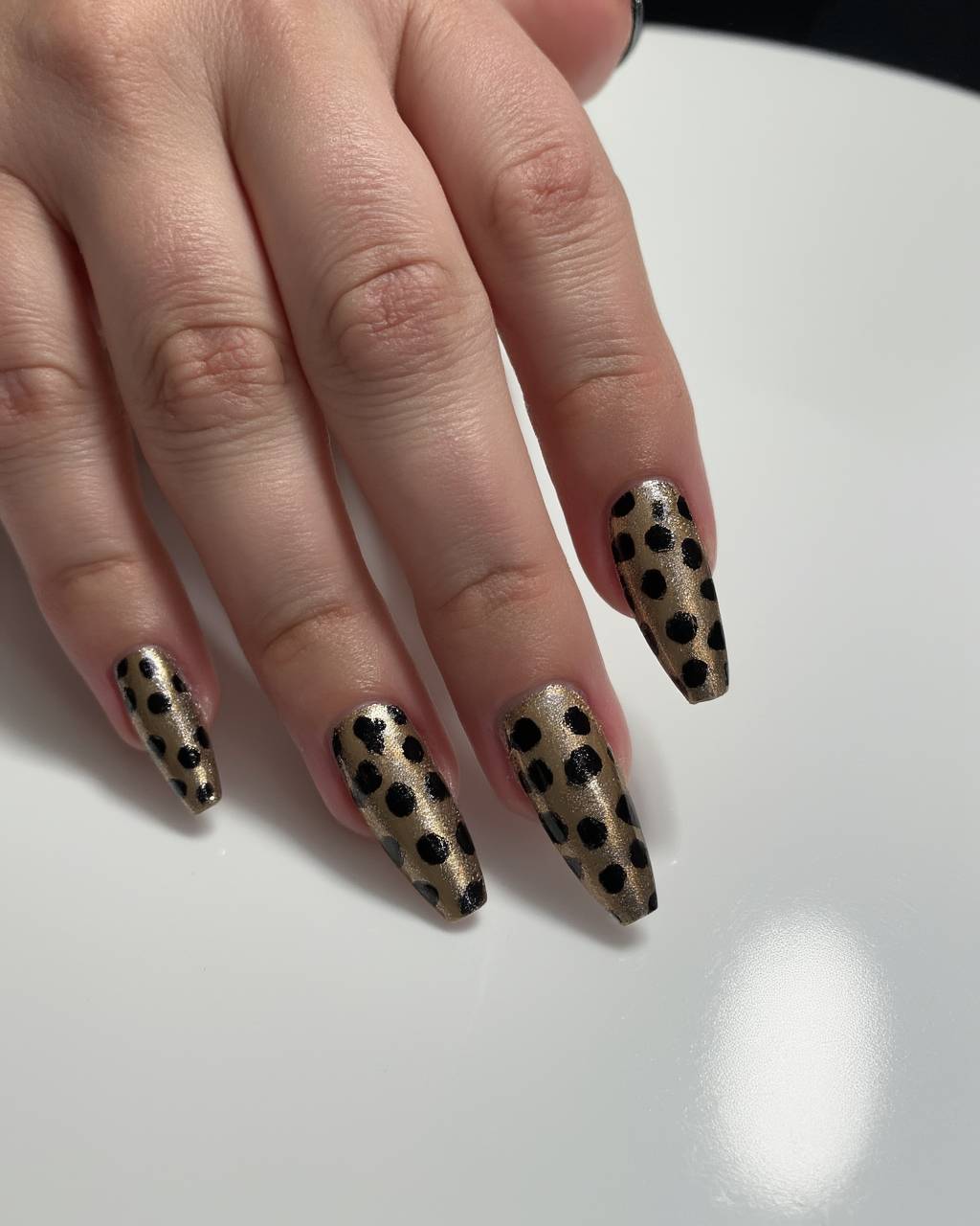 Stiletto animal print nail design by Bella Romano