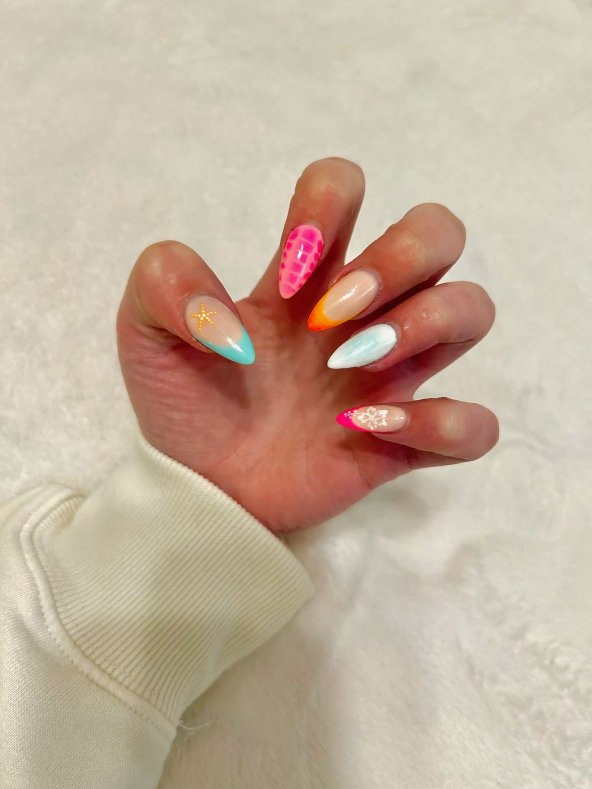 Squoval animal print nail design by Elena Grace