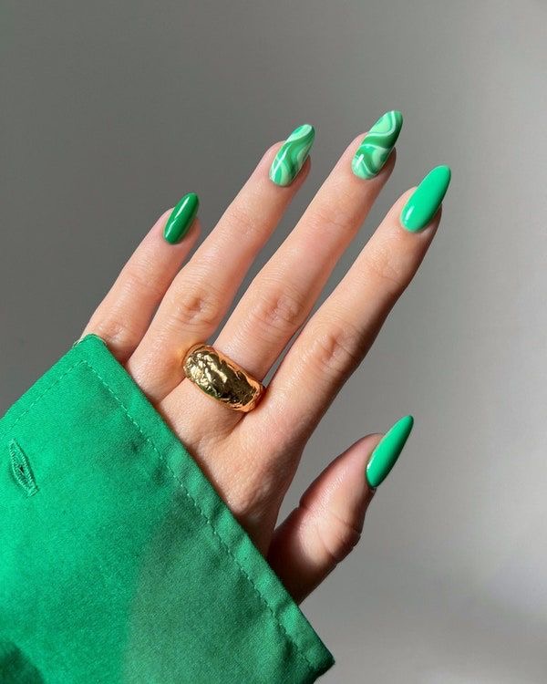 Almond animal print nail design by Kira Volkov