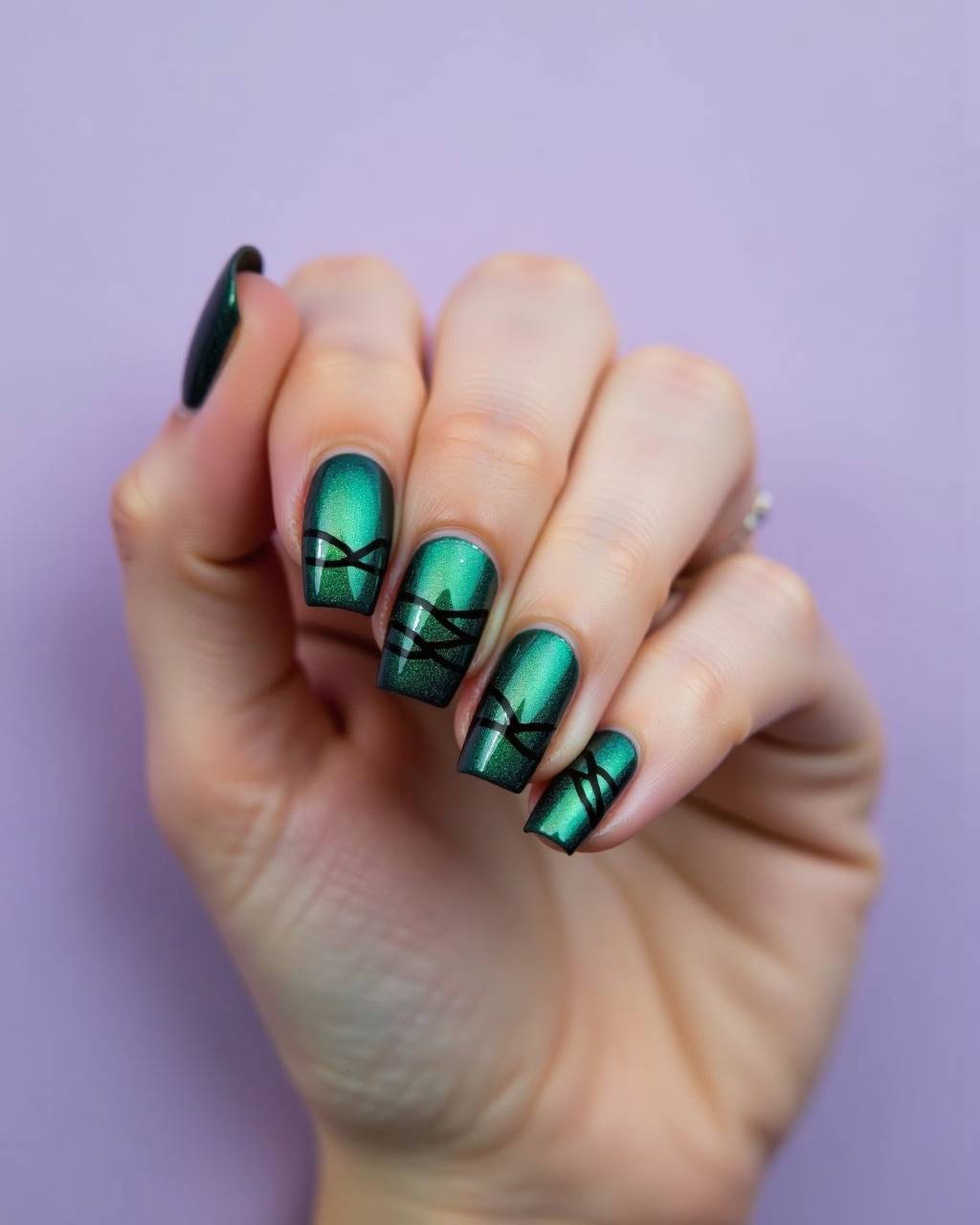 Squoval line art nail design by Mia Alvarez