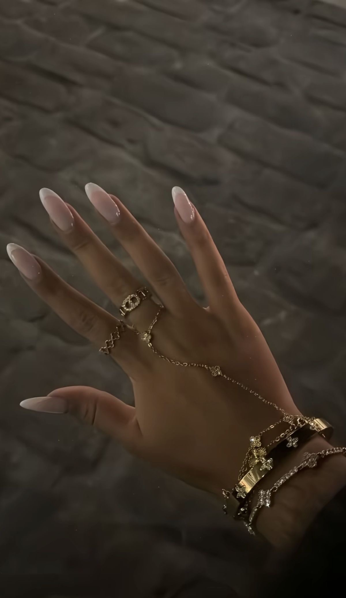 Stiletto glitter French nail design by Sadie Bloom