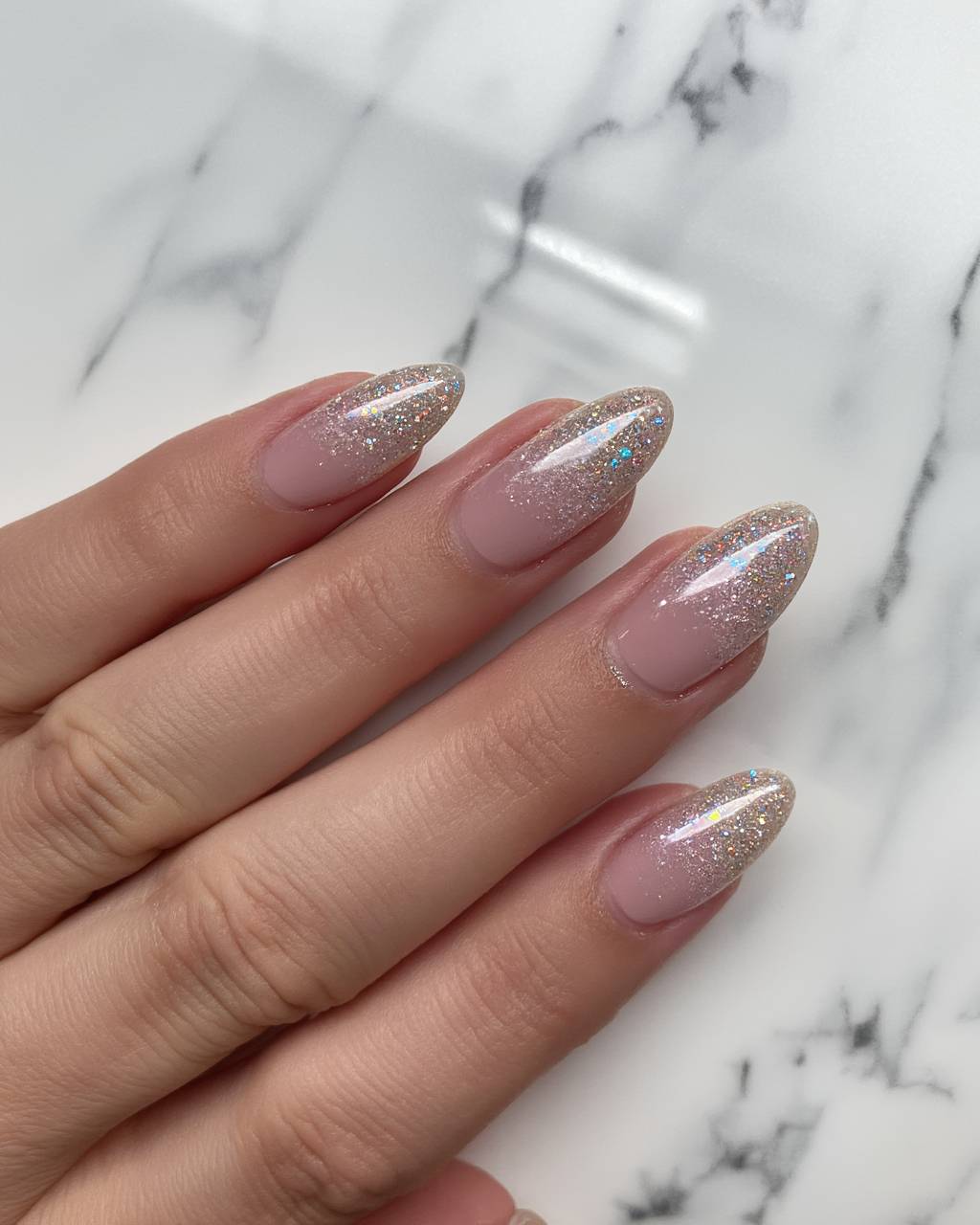 Squoval glitter French nail design by Lola Fernandez