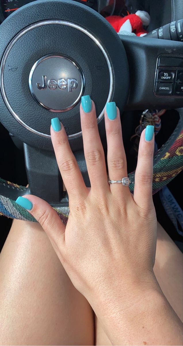 Almond minimalist nail design by Nina Patel