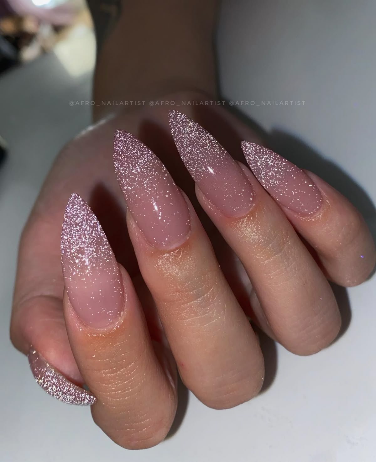 Oval aura nail design by Maya Lin