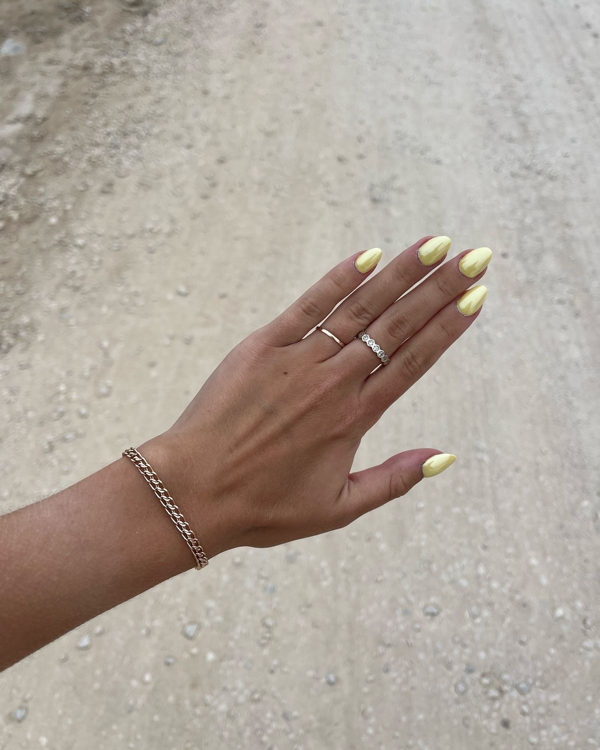 Almond rhinestone nail design by Bella Quinn